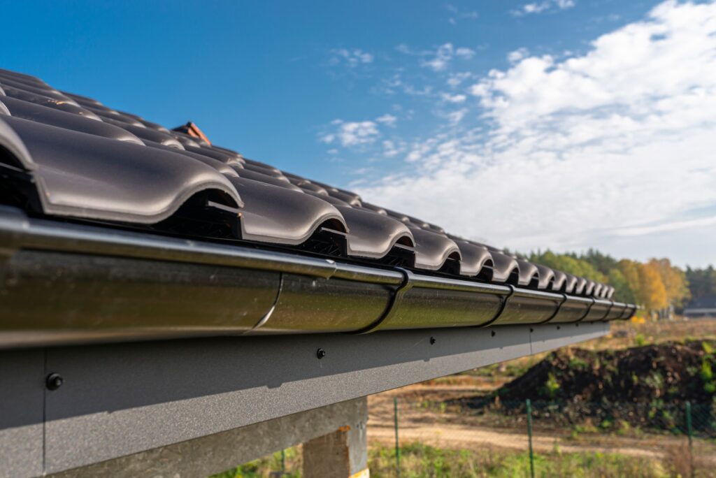 Professional Gutter Cleaning Services in Winchester by RB Solutions 8 Professional Gutter Cleaning Services in Winchester by RB Solutions a metal black gutter on a roof covered with ceram 2023 11 27 05 16 19 utc